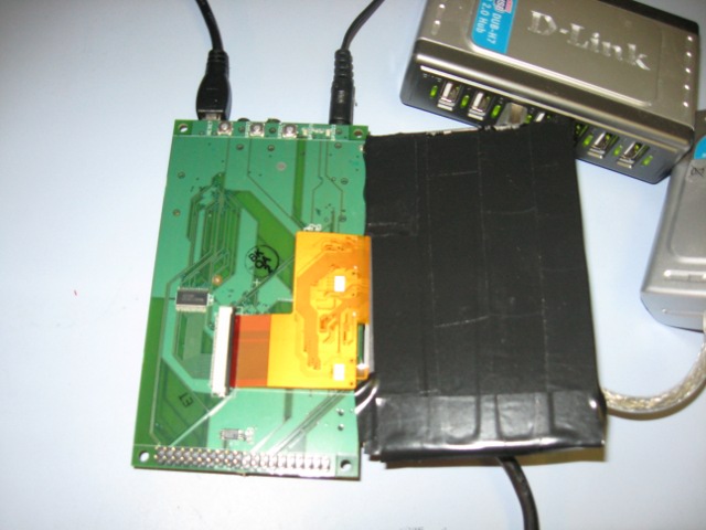 Display connected to Palo baseboard.  Note the tape applied to the display to keep from shorting to components on baseboard.